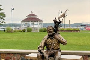 Ernest Hemingway Bronze Sculpture by George Lundeen. Located in Walloon Lake, MI.