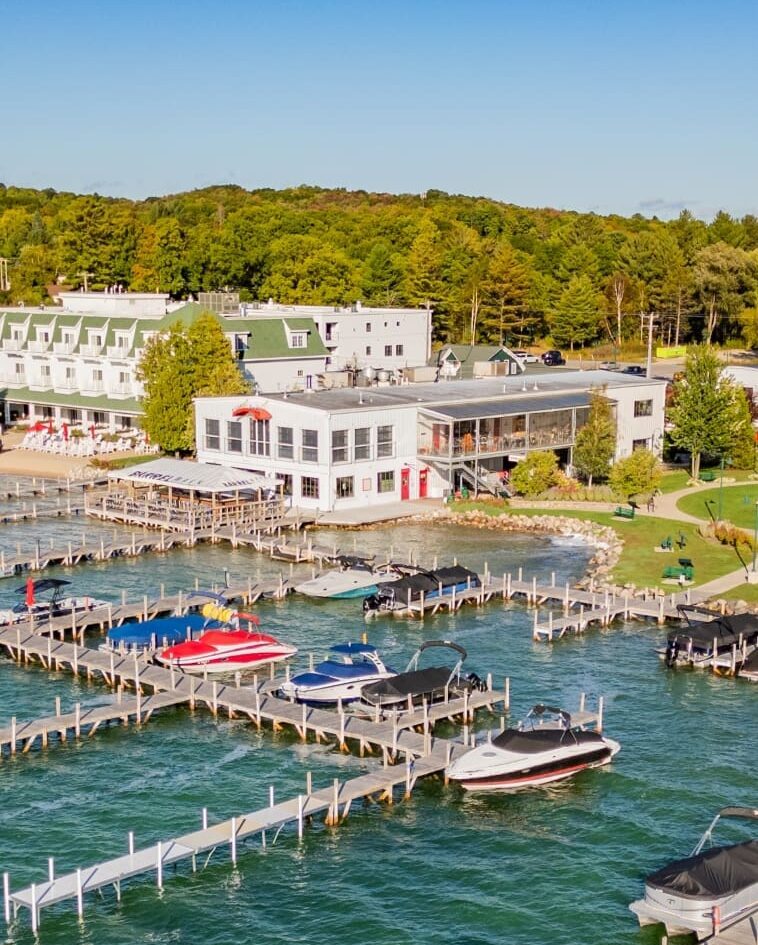 Boats docked at Legacy Watersports on Walloon Lake during the Rock Out With Your Dock Out summer kickoff event.